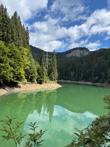 A green mountain lake