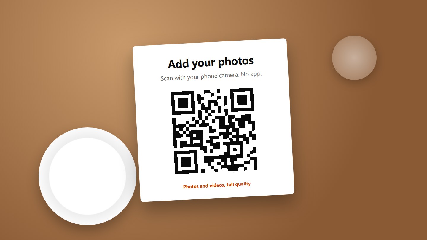 A table card with a QR code and the text Add your photos
